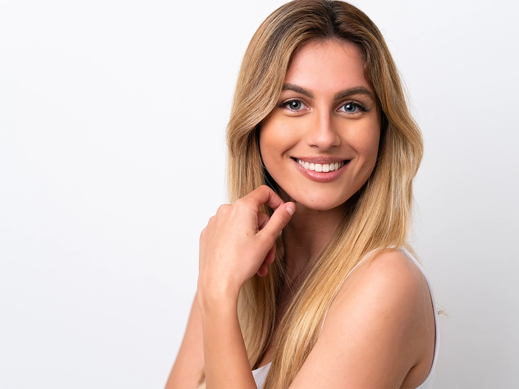 young beautiful woman with white smile